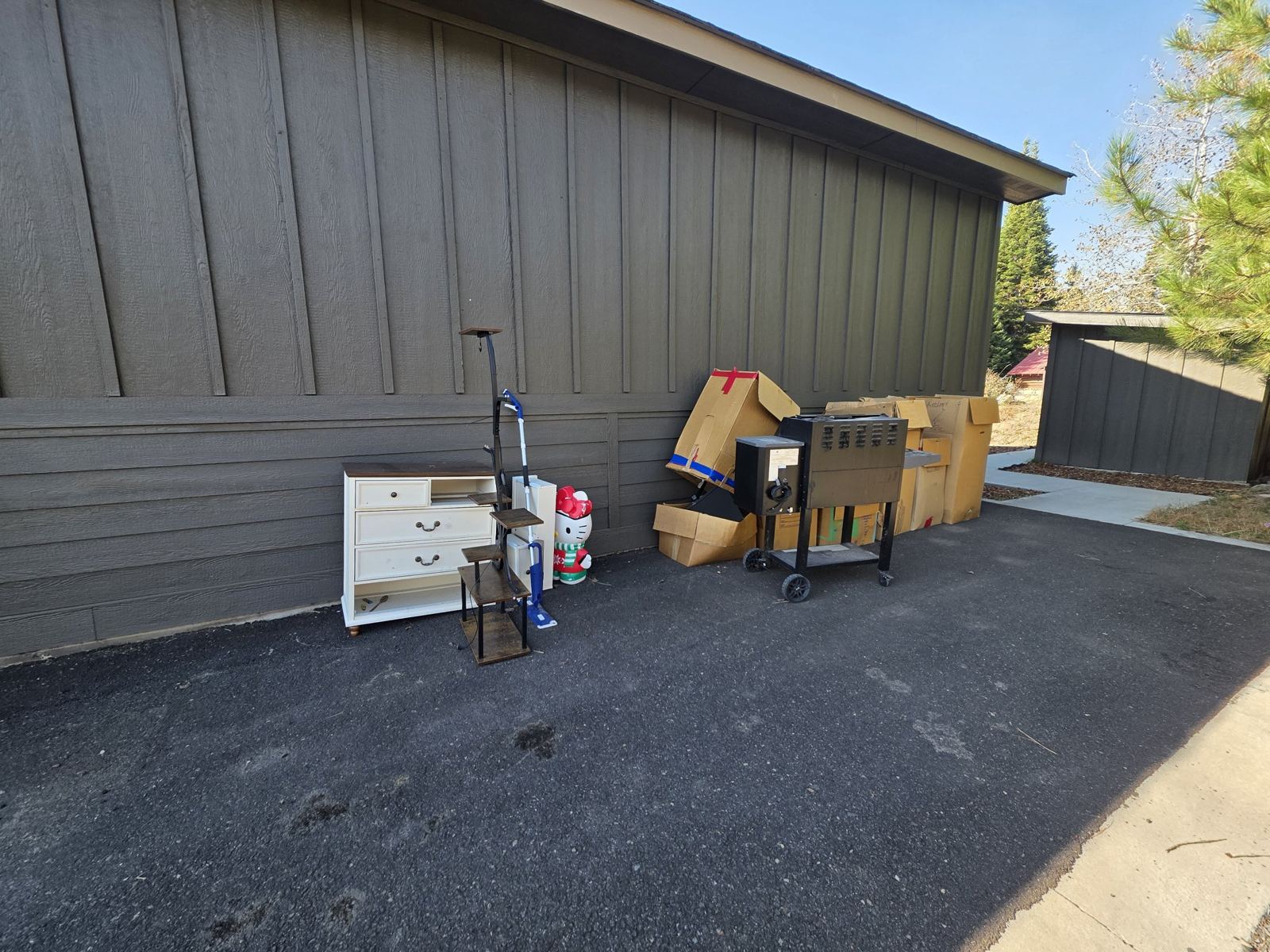 Furniture and boxes staged for haul-off