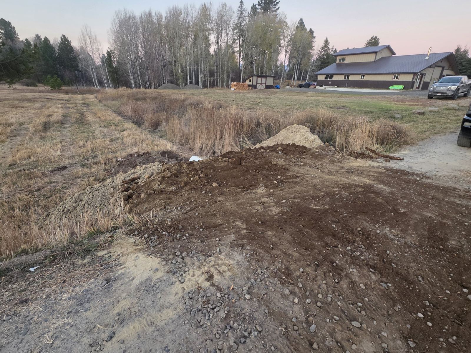 Fill dirt hauled in and placed